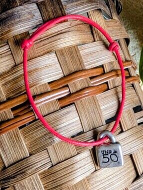 Uno de 50 Silver Plated Red Cord Adjustable Bracelet